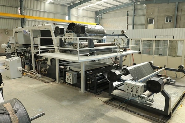 WOVEN FABRIC LAMINATION PLANT